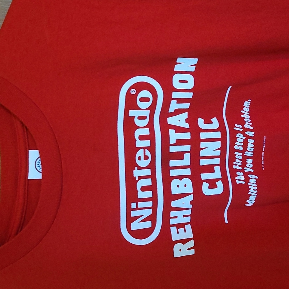 Men's size large red Nintendo rehab t-shirt.